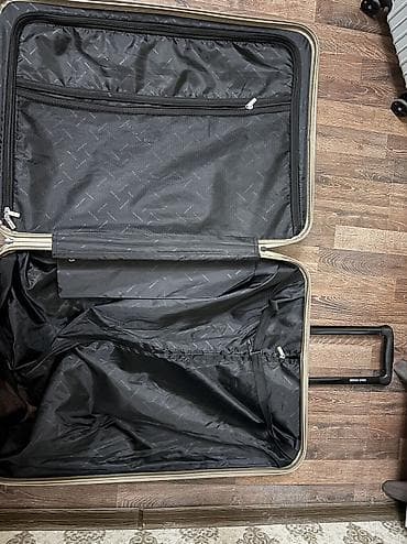 Книги и журналы: Gino Rossi sərt korpuslu çamadan - Rəng: qəhvəyi/bronza - Material — 7