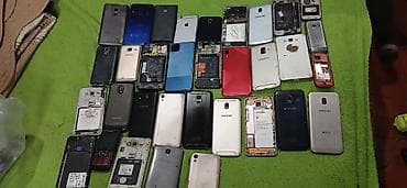 Müxtəlif markalı smartfon və düyməli telefonlardan ibarət böyük lot