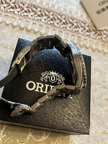 saat qolbaqlari: Yeni, Qol saatı, Orient, rəng - Qara — 4