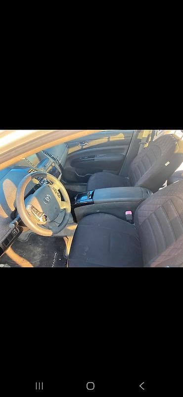 Nəqliyyat: Toyota Prius (ikinci nəsil, liftback) – hibrid Özəlliklər: - Hibrid — 2