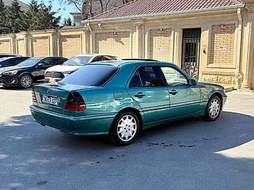 015 fara: Mercedes-Benz C-Class: 2.4 l | 1998 il Sedan — 2
