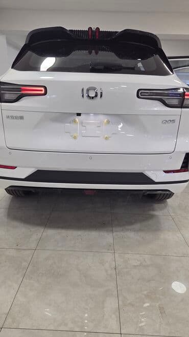 yağış sensoru: Model: Qiyuan Q05 125 km AIR (ağ rəngli, SUV) Xüsusiyyətlər və dizayn — 2