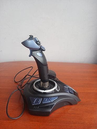 Digər oyun və konsollar: Genius MaxFighter F-31U Vibration Joystick modelidir. Əsasən uçuş — 1