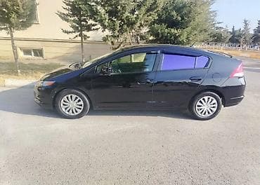 Honda Insight hibrid hetçbek satilir. Ili 2009.Mator 1.5 hibrid. - — 2
