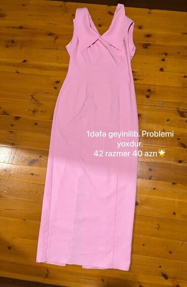 Qadın şalvarları: Məhsul: Qızılı çalarlı açıq çəhrayı rəngdə uzun don - Ölçü: 42 - — 1