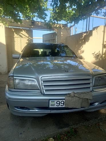mersedes vita: Mercedes-Benz C-sinfi (W202) sedan, gümüşü rəng. Əsas xüsusiyyətlər: - — 6