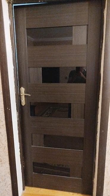 Bu qapidan 3 ededdir. hunduru 2 metr. eni 84. seliqeli qalib