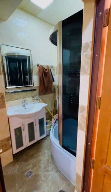 yeni ramana kirayə evlər: Yasamal Mall un yaninda 18 mərtəbənin,12-ci mərtəbəsində,2 otaq — 9