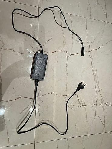 Elektrik nəqliyyatı: İdeal veziyyetde, adapteri var, 1-2 gun zaretka saxlayir, yuk — 4