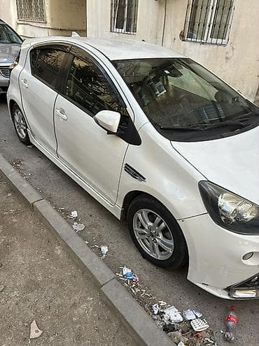 belarus 1221 satisi: Toyota Aqua hibrid hetçbek Maşın bakıdadı real alıcıya cuzi endirim — 3