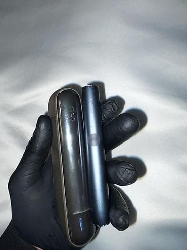 IQOS elektron tütün qızdırma cihazı və daşıma/şarj futlyarı -