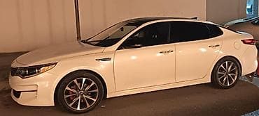 zil radiatoru: Kia Optima – ağ rəngli, zərif və dinamik sedan. Xüsusiyyətlər: - — 1