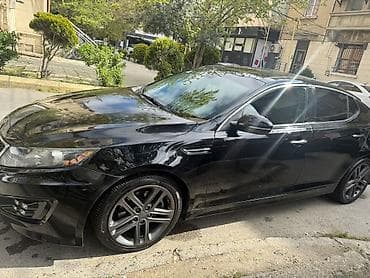 Avtomobil satışı: Kia Optima – qara rəngli, zərif və dinamik sedan. - Korpus: 4 qapılı — 4