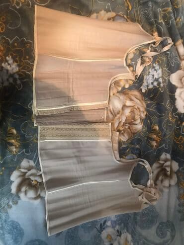 string alt paltarı: Qadın üçün korset. İkisi 50 manat. Tək tək də satılır. Bej rəngində. M — 1