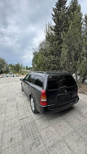 opel zafira a: Opel Astra: 2 l | 1998 il 437306 km Universal — 8