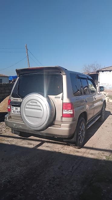 tom ford lost cherry: Mitsubishi Pajero: 1.8 l | 2000 il Sedan — 3