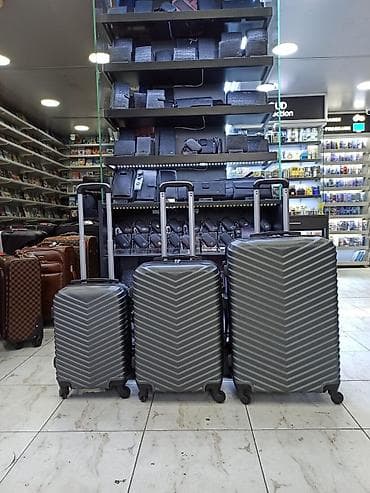 Çamadanlar: Sərt korpuslu çamadan dəsti – 3 ölçü - Material: yüngül və davamlı — 1