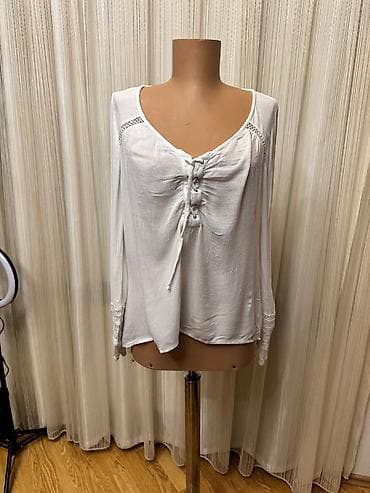 təbii qadın şubaları: Ağ rəngli qadın bluzu.Raxmrt M.Hollidter firmasi - Üslub — 1