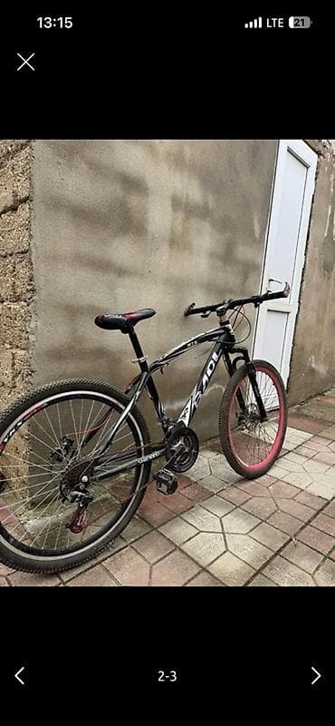 Elektrik velosipedlər: MTB tipli dağ velosipedi – ZADL/ADL brendli, qara-ağ rəng sxemi və ön — 2