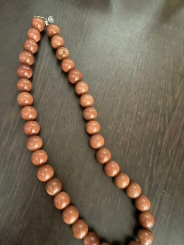 tək qaş: Boyunbağı — 1