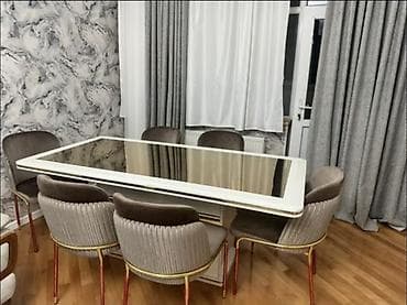 - Masa: Düzbucaqlı formalı, ağ rəngli qalın çərçivəli üstlük. Ortası — 2