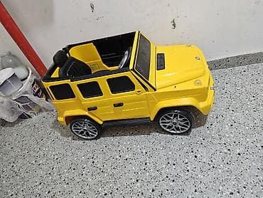 deri plas: Uşaqlar üçün elektrikli mini avtomobil – sarı rəngli SUV üslubunda — 1