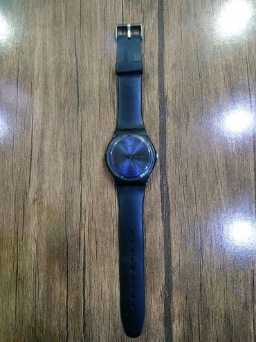 irshad telecom is saatlari: Saat Swatch orginaldi.
Hec bir problemi yoxdu islekdi — 3