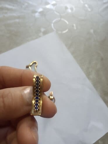 1 qram qizilin qiymeti: Dəstə daxildir: Üzük, Sırğa, Kulon, Gümüş — 3