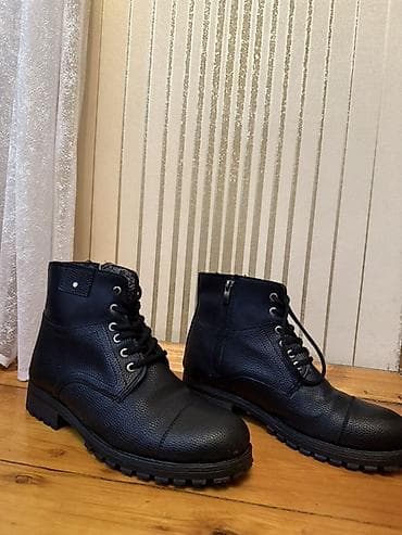 Məhsul: Kişi qış botları - Rəng: Qara - Üst material: Toxumalı