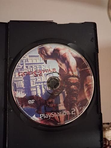 pleşteşin: PlayStation 2 Slim + 1 ədəd orijinal pult +God of war disqi 2 yaddas — 3