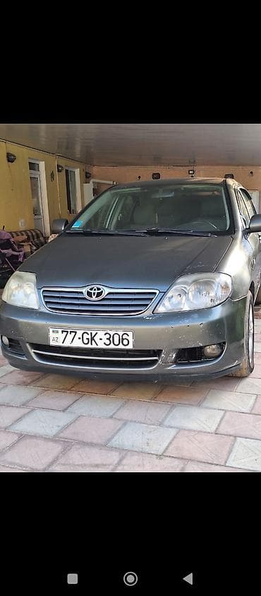 Toyota Corolla (E120) sedan - Rəng: boz/metallik - Kuzov: sedan, 4