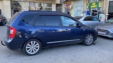 Aksesuarlar və tüninq: Kia Carens CRDi – dizel, avtomat - Kuzov: tünd mavi, 5 qapı — 6