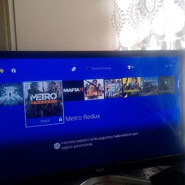 пульт playstation 4: Sony PlayStation 4 (PS4) oyun konsolu - Rəng: Qara, klassik “Jet — 4