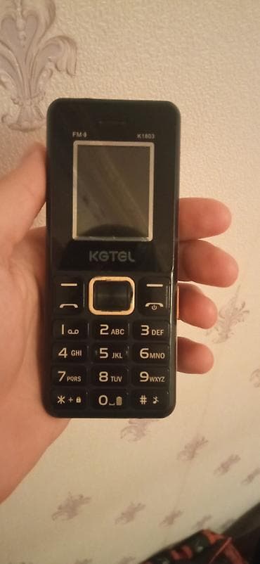 KGTEL K1803 düyməli telefon Xüsusiyyətlər: - Kompakt korpus, böyük və