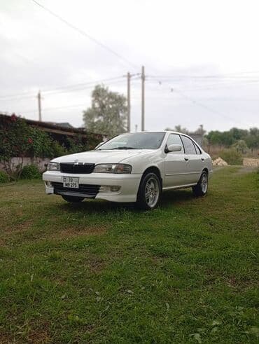 Nissan Sunny: 1.6 л | 2000 г. Седан — 8