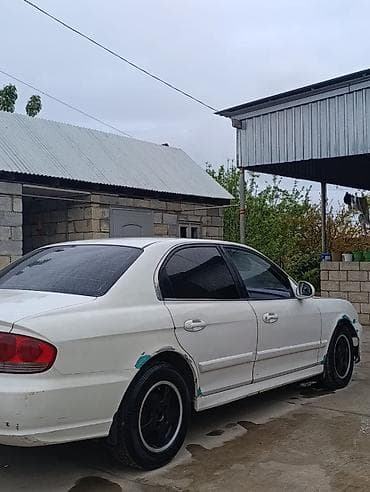 nissan 2 7: Hyundai Sonata: 2 l | 2003 il Sedan — 3