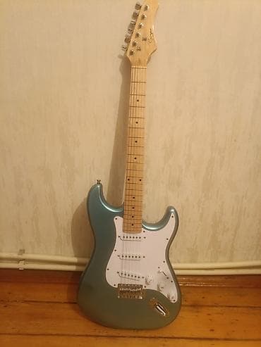 Elektrik gitara – Strat tipli korpus - Korpus: klassik Stratocaster — 1