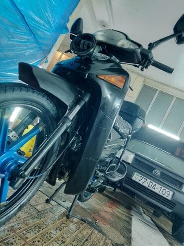 Skuter tipli motosiklet – şəhər içi sürüş və gündəlik istifadə üçün