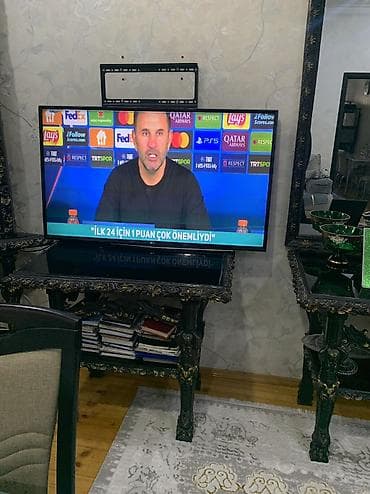 a 32 ekran: LG LED televizor (təxminən 43–50 düym) - Ekran: LED, Full HD/4K — 5