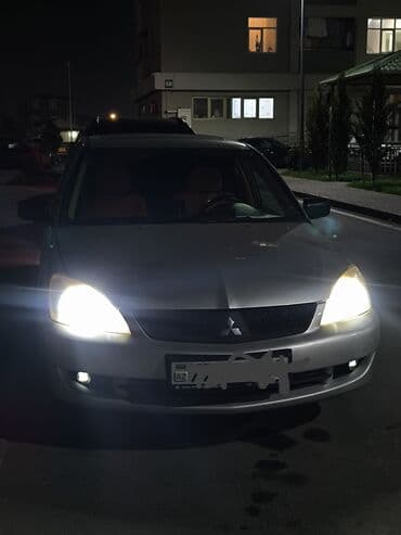 e 124: Mitsubishi Lancer: 1.6 l | 2006 il 34000 km Sedan — 9