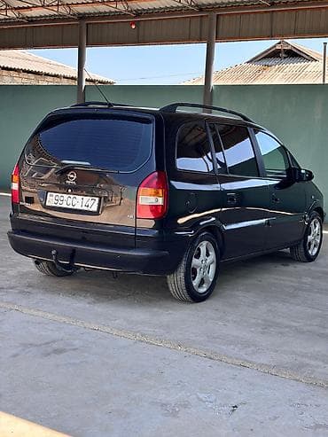 p4 disk: Opel Zafira: 1.8 l | 2004 il 350000 km Van/Minivan — 2