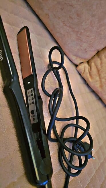 Zərərvericilərə qarşı mübarizə aparatları: Saç düzləşdirici - Marka: Braun (korpus üzərində “Braun” yazısı) - — 1