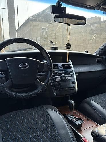 uzun guzgu: Nissan Teana: 2.3 l | 2003 il Sedan — 5