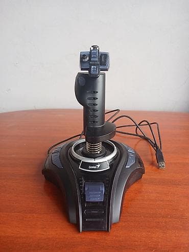 Digər oyun və konsollar: Genius MaxFighter F-31U Vibration Joystick modelidir. Əsasən uçuş — 2