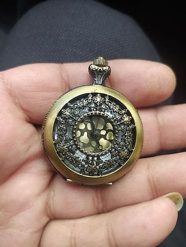 qedimi saatlar: Antik üslubda cib saatı - Korpus: metal, bürünc tonlarında, ön — 1