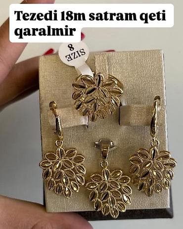 Qızılı rəngdə zərgərlik dəsti – sırğalar + kulon + üzük. - Material