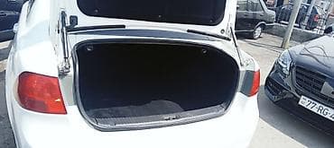 kia opdima: Kia Optima sedan – ağ rəng, 4 qapı, ön‑çəkiş. 2008 ci il motor təzə — 6