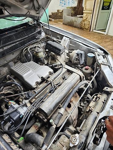 kia ceed ekran: Honda CR‑V, 1-ci nəsil, gümüşü rəngdə SUV. Texniki və dizayn — 6