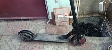 Elektrik skuter - Qara rəngdə, şəhər üçün komfortlu dizayn - Ön və lalafo.az -da Elektrik skuter - Qara rəngdə, şəhər üçün komfortlu dizayn - Ön və