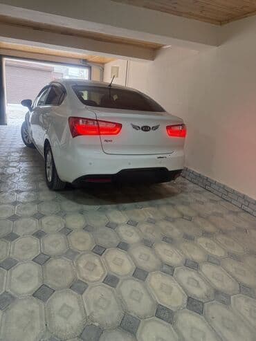 mercedes e 240: Kia Rio sedan - ağ rəng,4qpı,servizdir,bez krasqadır və bərəbər — 3
